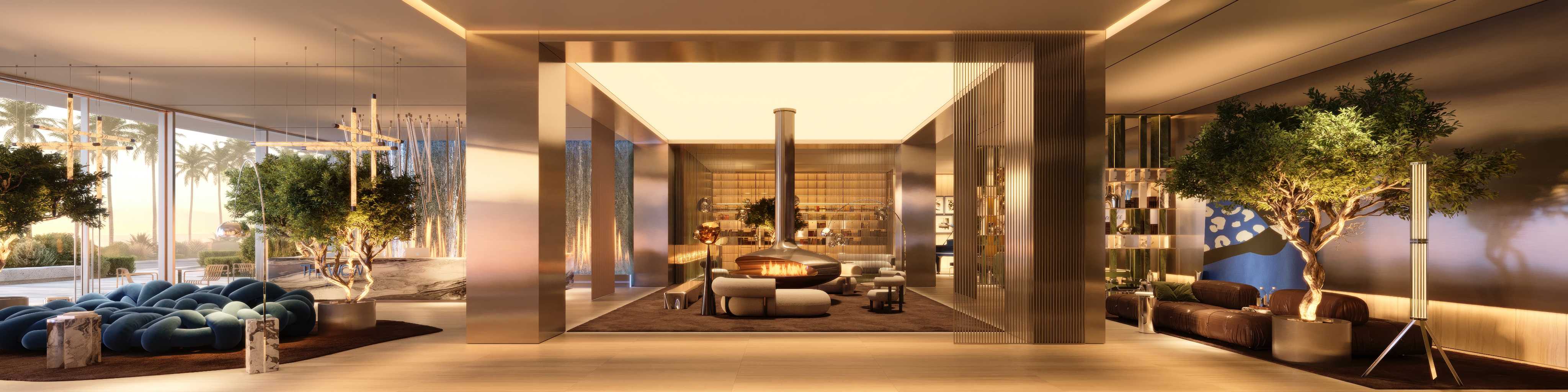 Grand lobby with suspended fireplace, library wall and blue sculptural sofa